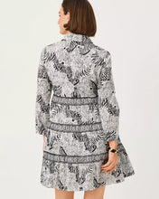 Load image into Gallery viewer, Woman wearing a zebra-print woven shirt dress with Greek key trim details and flounced hem