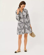 Load image into Gallery viewer, Woman wearing a zebra-print belted shirt dress with long sleeves and Greek key trim detailing