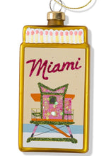 Load image into Gallery viewer, Decorative glass Christmas ornament shaped like a Miami matchbox with lifeguard stand design