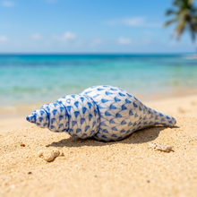 Load image into Gallery viewer, Herend hand-painted porcelain shell figurine with intricate fishnet pattern resting on sandy beach