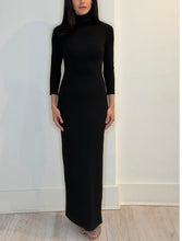 Load image into Gallery viewer, Black turtleneck maxi dress with 3/4 sleeves and slim fitted silhouette