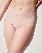 Load image into Gallery viewer, Model wearing Spanx Fit-To-You Brief, a smooth, seamless mid-rise underwear with light coverage