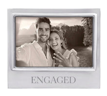 Load image into Gallery viewer, Mariposa Engaged Signature Frame displaying a happy couple's engagement selfie photo