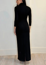 Load image into Gallery viewer, Black maxi turtleneck dress with 3/4 sleeves and back slit, rear view