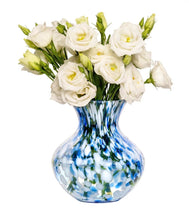 Load image into Gallery viewer, Juliska Puro glass vase with speckled pattern holding white lisianthus flowers in bloom
