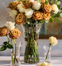 Load image into Gallery viewer, Elegant crystal corset vase holding lush roses, flanked by two smaller matching vases