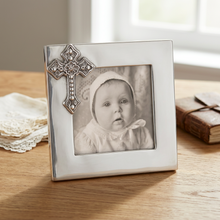 Load image into Gallery viewer, Elegant silver picture frame with ornate decorative cross embellishment, displaying a baby portrait photo