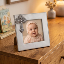 Load image into Gallery viewer, Elegant cross-adorned photo frame displaying a smiling baby, styled on a wooden dresser