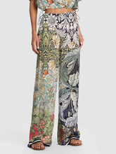 Load image into Gallery viewer, Wide-leg flowy pants featuring an intricate Arts and Crafts botanical floral print pattern