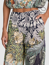 Load image into Gallery viewer, Wide-leg floral botanical print pants with elastic waistband and side pocket detail