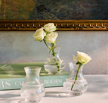 Load image into Gallery viewer, Three elegant glass bud vases with textured details, holding fresh white roses on a linen surface