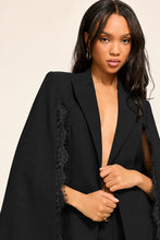 Load image into Gallery viewer, Ramy Brook black cape blazer with floral lace trim along open side slits