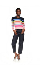 Load image into Gallery viewer, Multicolor striped cashmere crew neck sweater with dark navy to pink gradient worn with dark jeans