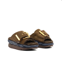 Load image into Gallery viewer, Luxury suede slide sandals with oversized gold buckle detail and fluffy shearling footbed