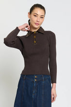 Load image into Gallery viewer, Woman wearing a ribbed knit polo sweater with leather collar and gold turnlock buttons