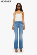 Mother Denim mid-rise flare jeans in medium blue wash with subtle fading