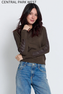 Olive knit crewneck sweater with dark brown faux leather sleeve panels and front pocket