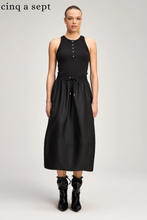 Load image into Gallery viewer, Black nylon midi skirt with drawstring waist paired with black pointed-toe booties
