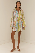 Load image into Gallery viewer, Woman wearing a floral striped long sleeve mini shirt dress with collared neckline