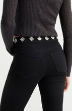 Load image into Gallery viewer, Back view of slim-fit jeans featuring crystal floral embellishments along the waistband