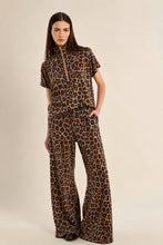 Load image into Gallery viewer, Wide leg leopard print pants in brown and black worn as a matching set