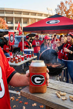 Load image into Gallery viewer, Smathers &amp; Branson Georgia Bulldogs needlepoint can cooler held at tailgate outside Sanford Stadium