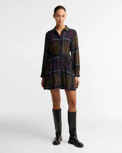 Load image into Gallery viewer, Woman wearing Barbour Ivybridge Mini Dress Tartan with long sleeves, drawstring waist, and knee-high boots