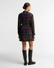 Load image into Gallery viewer, Woman wearing Barbour Ivybridge Mini Dress Tartan with long sleeves and knee-high boots, back view