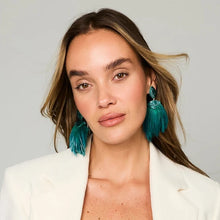 Load image into Gallery viewer, Mignonne Gavigan Lisboa teal feather drop earrings worn by model in white blazer