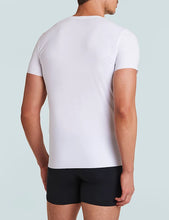 Load image into Gallery viewer, Man wearing a fitted crewneck undershirt, back view, paired with boxer briefs