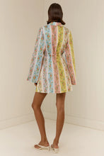 Load image into Gallery viewer, Woman wearing a floral striped long-sleeve blazer mini dress with cinched waist, back view