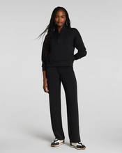 Load image into Gallery viewer, Spanx black petite straight leg pants with wide leg opening worn with sneakers