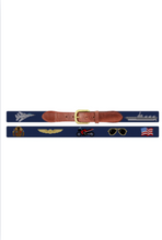 Load image into Gallery viewer, Navy needlepoint belt with aviation motifs and tan leather brass buckle