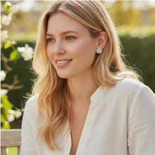 Load image into Gallery viewer, Woman wearing elegant Rainbow Moonstone Drop Forte Earrings by Tat2, showcasing their luminous gemstone stud design.
