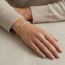 Load image into Gallery viewer, Gold curb chain ID bracelet with diamond pavé bar worn on wrist
