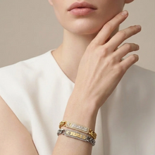 Load image into Gallery viewer, Model wearing stacked Tat2 Vintage Silver Soleil ID Bracelet with chain and crystal details