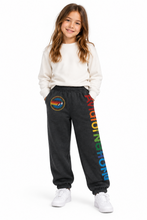 Load image into Gallery viewer, Girl wearing Aviator Nation Kids Venice Sweatpant with rainbow logo graphic and jogger cuffs