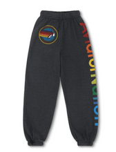 Load image into Gallery viewer, Kids relaxed-fit sweatpants featuring rainbow leg lettering and circular surf-inspired patch logo