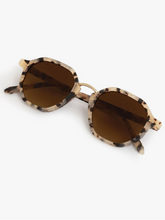 Load image into Gallery viewer, Krewe Dakota polarized sunglasses with tortoise acetate frames and gold bridge detail, folded