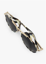 Load image into Gallery viewer, Krewe Coleman Blinker 12K Bone folded sunglasses with marbled acetate frames and gold metal temples