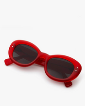 Load image into Gallery viewer, Retro oval acetate sunglasses with bold thick frames and dark tinted lenses, folded