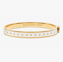 Load image into Gallery viewer, Halcyon Days skinny hinged bangle featuring star motifs on enamel with gold-tone finish