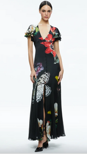 This Alice + Olivia dress is a showstopper. It is a maxi length dress that features a v-neckline that is button down the front. It is a black background with vibrant flowers and butterflies. Sleeves are flowy.