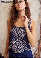 Navy blue sleeveless embroidered top with white floral scalloped eyelet details