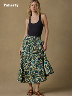 Faherty floral linen maxi skirt in teal and navy with smocked waistband, worn with black tank