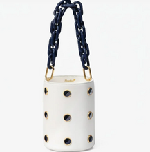 Load image into Gallery viewer, White leather bucket bag with navy grommets and chunky navy chain strap
