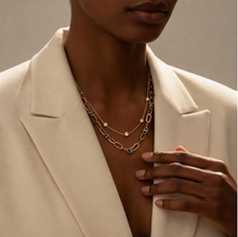 Load image into Gallery viewer, Layered chain necklace with diamond stations and toggle links styled on model