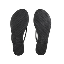 Load image into Gallery viewer, Solei Sea Vivie flip flop sandals showing textured rubber outsoles with swirl pattern tread