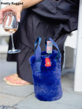 Load image into Gallery viewer, Luxurious faux fur wine tote bag with handles holding a bottle of wine