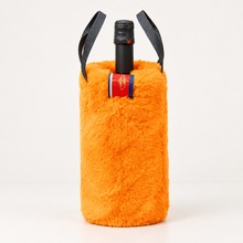 Load image into Gallery viewer, Fluffy faux fur wine bottle tote bag with dark carrying handles and visible bottle